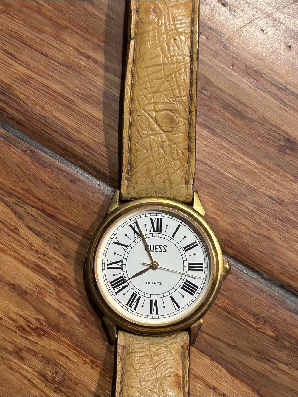 Vintage 90s Guess quartz watch with Roman numerals.